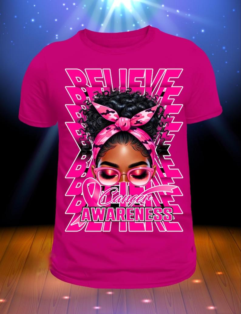 Believe – Breast Cancer Awareness T-Shirt | Pink Ribbon Black Woman Graphic Tee